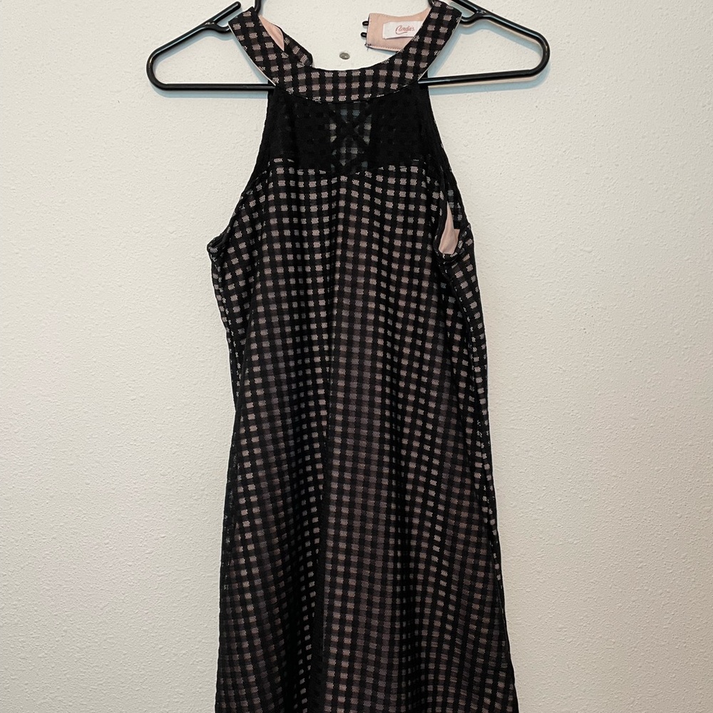 Cute black dress with light pink lining underneath